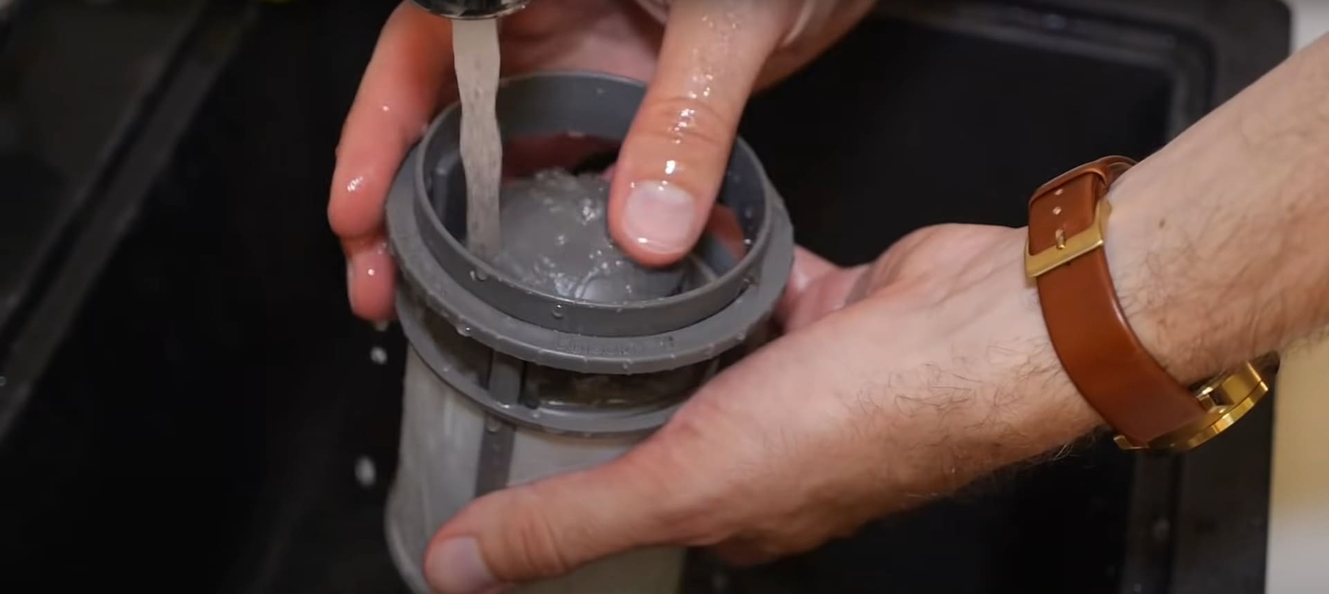 Dishwasher Element Being Rinsed