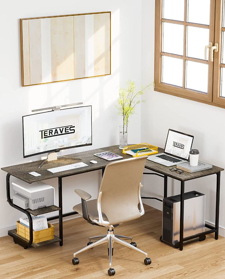 L Shaped Desk With Computers on it